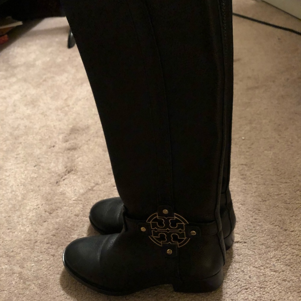 Tory Burch riding boots.